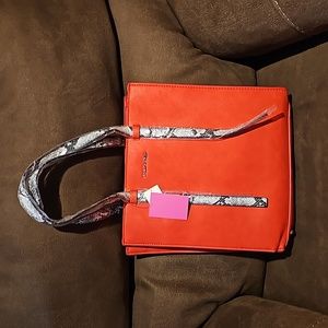 Sassy Jones brand new purse. Beautiful color Salmon!